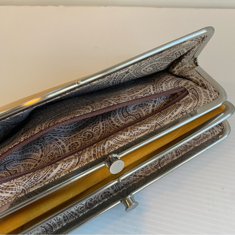 Unique, vintage style, fucntional clutch in mustard yellow.